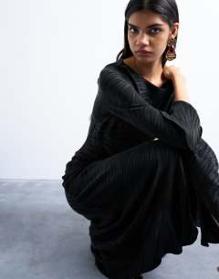 Model wearing Slash neck midi dress in black premium cupro jacquard