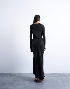 Model wearing Slash neck midi dress in black premium cupro jacquard