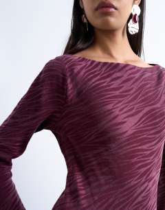 Model wearing Slash neck midi dress in burgundy premium cupro jacquard