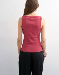 Model wearing Slash neck racer vest in berry