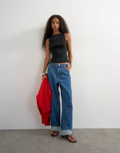 Model wearing Slash neck racer vest in washed black