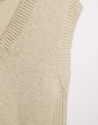 beige sleeveless sweater