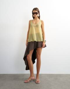 Model wearing Sleeveless organza scoop vest in muted lime