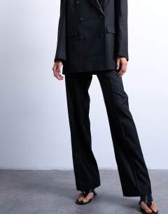 Model wearing Slim straight leg mid rise suit trouser co ord in black