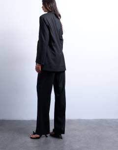 Model wearing Slim straight leg mid rise suit trouser co ord in black