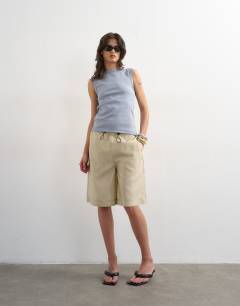 Model wearing Slim tank in dusty blue