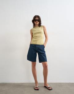 Model wearing Slim tank in soft lime