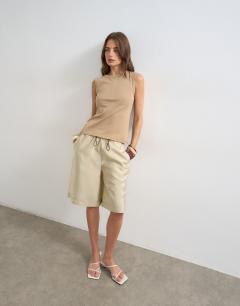Model wearing Slim tank in stone