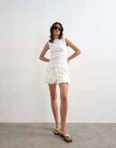 Model wearing Slim tank in white