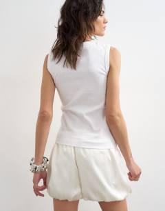 Model wearing Slim tank in white