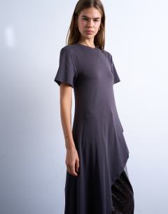 Model wearing Slinky asymmetric short sleeve tunic top in charcoal grey