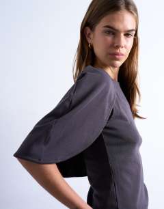 Model wearing Slinky cape detail top in charcoal grey