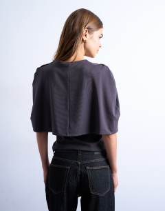 Model wearing Slinky cape detail top in charcoal grey
