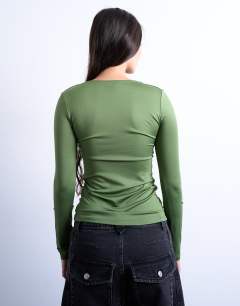 Model wearing Slinky crew neck long sleeve top in khaki
