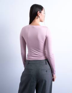 Model wearing Slinky crew neck long sleeve top in pink