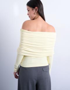 Model wearing Slinky deep fold bardot long sleeve top in buttermilk