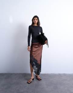 Model wearing Slinky scoop back long sleeve top in black