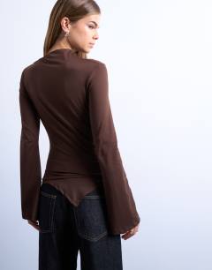 Model wearing Slinky slash neck asymmetric top in chocolate