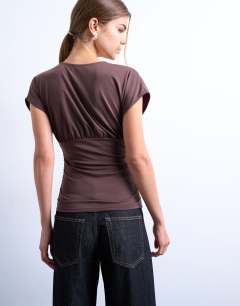 Model wearing Slinky v-neck ruched top in chocolate brown