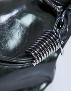 Model wearing Sloane hardware scoop shoulder bag in deep khaki