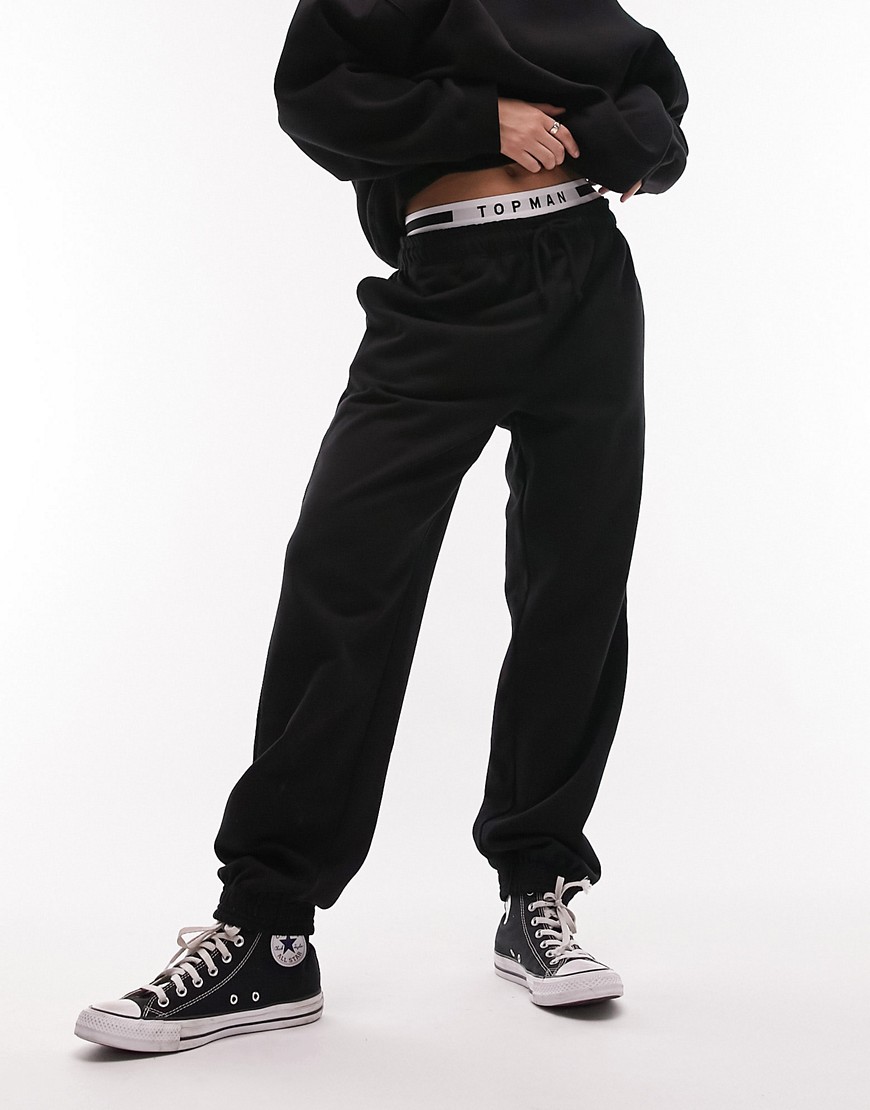 Topshop slouchy oversized cuffed sweatpants in black - part of a set