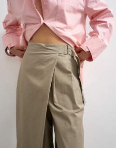 Model wearing Smart casual techy wrap buckle detail trouser in mushroom