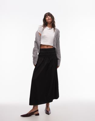 smocked waist maxi skirt in black with white topstitching