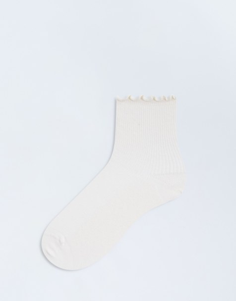 Topshop – Smörgula, ribbade strumpor med volang - view 1