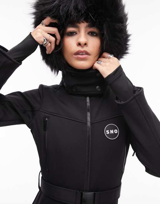 Topshop - Sno - Combinaison de ski avec capuche en fausse fourrure et  ceinture - Noir