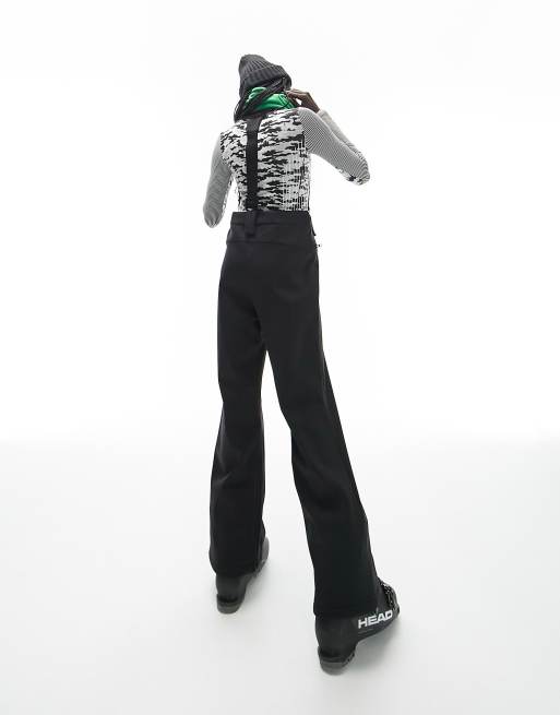 flared ski pants with suspenders in |