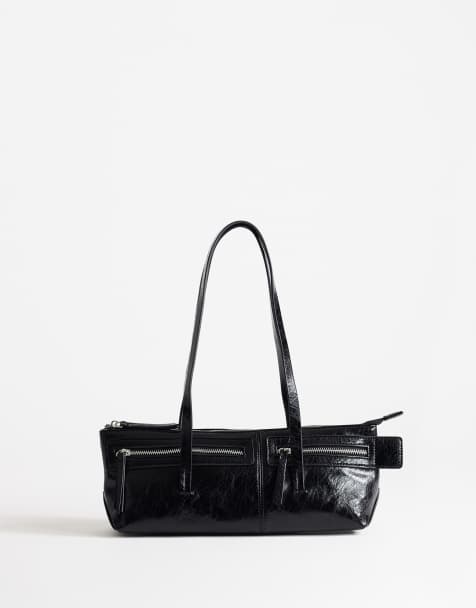 Topshop Snoopy small zip front pocket shoulder bag in black - view 1