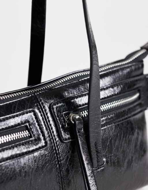 Topshop Snoopy small zip front pocket shoulder bag in black, 3 of 4