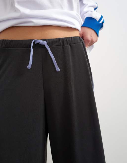Topshop soft stripe awkward length bottoms in black, 2 of 5