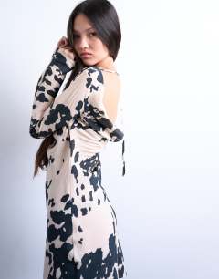 Model wearing Soft touch cupro cowl back mini dress in cow hide print