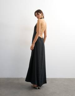 Model wearing Soft touch cupro halter neck low back maxi dress in washed black