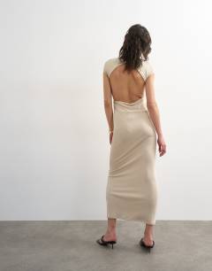 Model wearing Soft touch double layer cupro cut out maxi in beige
