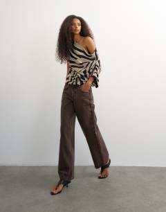 Model wearing Soft touch drape shoulder top in zebra print