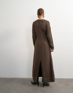 Model wearing Soft touch drop armhole maxi dress in chocolate with ecru contrast topstitching