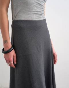 Model wearing Soft touch drop waist maxi skirt in charcoal grey