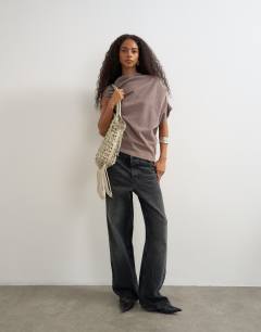 Model wearing Soft touch fallen shoulder top in oat