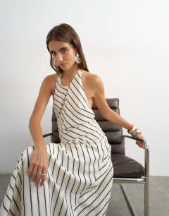 Model wearing Soft touch halter neck low back maxi dress in woven mono stripe