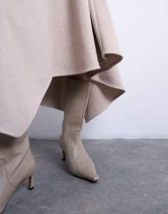 Model wearing Soft touch hanky hem asymmetric skirt co-ord in taupe