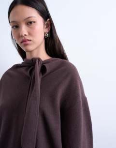 Model wearing Soft touch neck tie long sleeve tee co-ord in chocolate