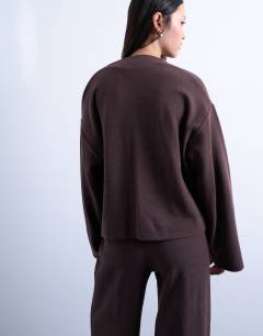 Model wearing Soft touch neck tie long sleeve tee co-ord in chocolate
