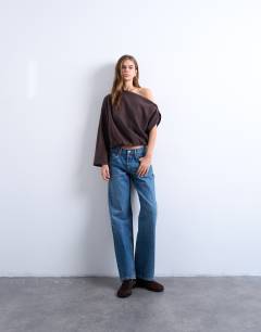 Model wearing Soft touch off shoulder knot side long sleeve top in chocolate