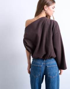 Model wearing Soft touch off shoulder knot side long sleeve top in chocolate