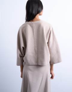 Model wearing Soft touch super wide crop sleeve tee co-ord in taupe
