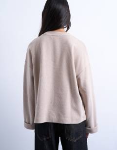 Model wearing Soft touch wide sleeve skater tee in taupe