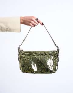 Model wearing Sol shoulder sequin bag with leather handle in khaki