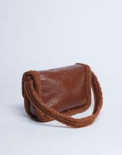 Model wearing Solo borg trim shoulder bag in tan